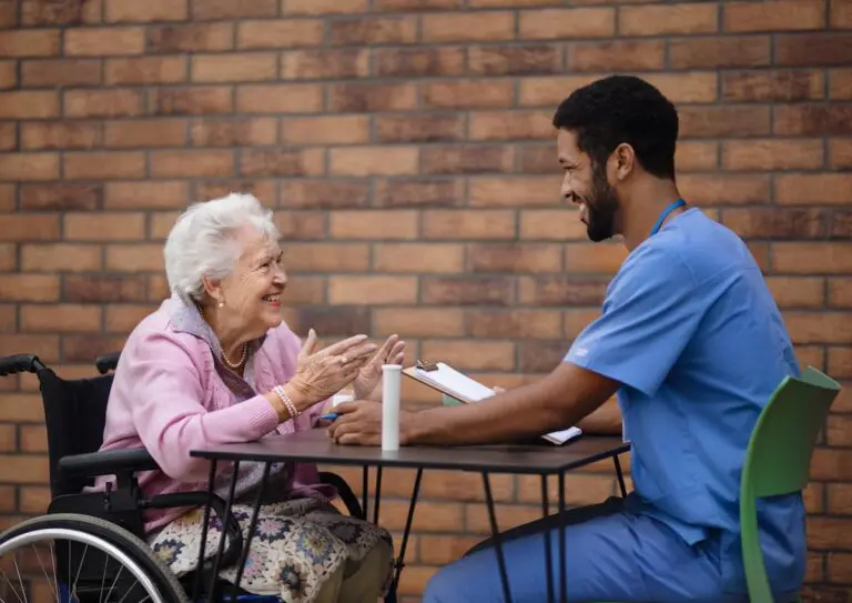 elderly woman and caregiver