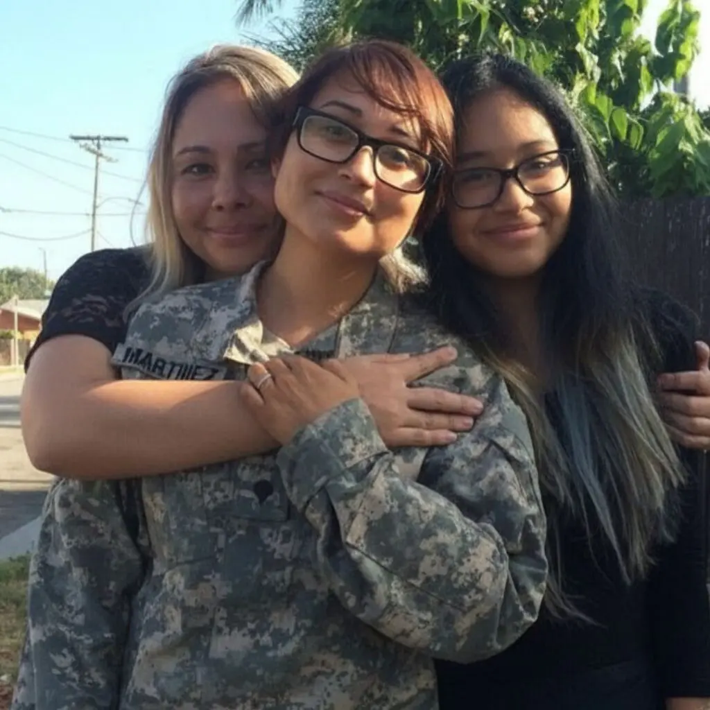 Staff Sgt. Diana Martinez with her mother and sister, Cambridge Caregivers Marketing Specialist Alex Arriola.