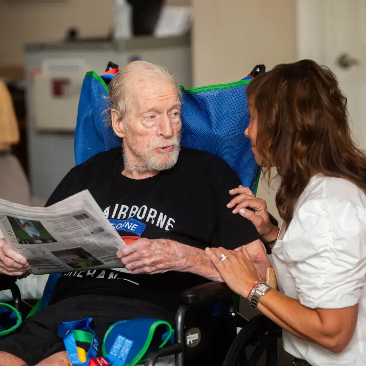 elderly man with caregiver