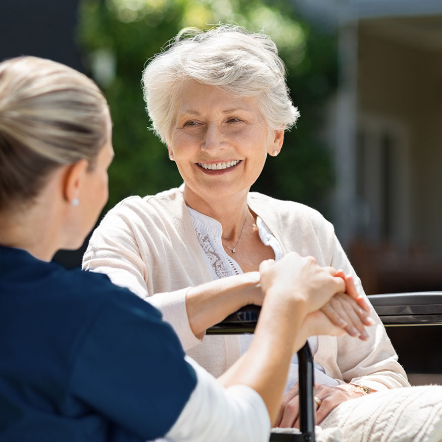 elderly woman and caregiver