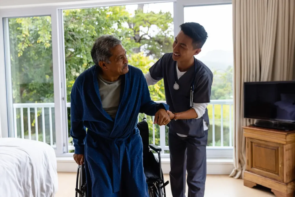 elderly man with caregiver